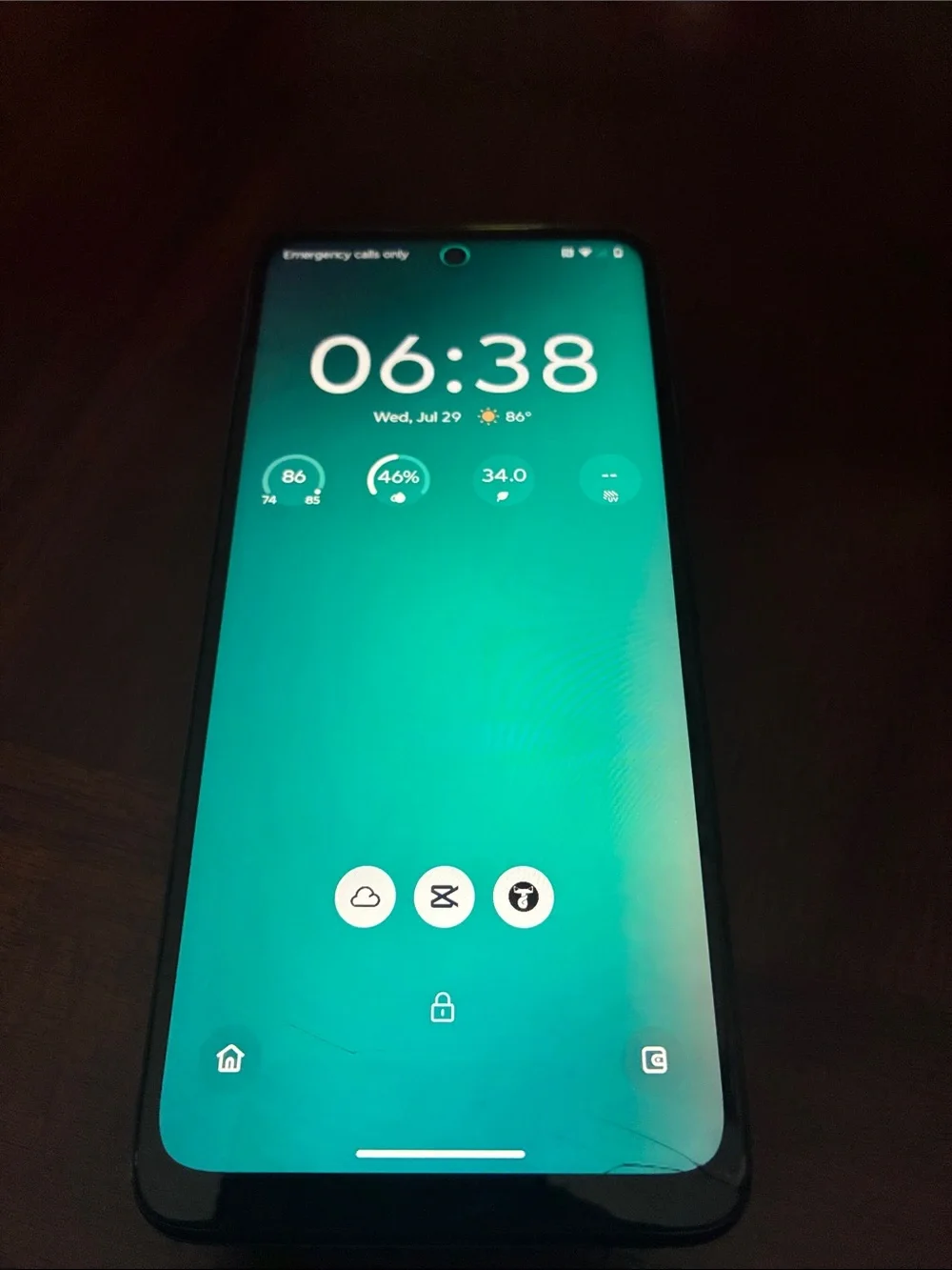 Motorola bluish grey Smartphone with Dark Teal Display